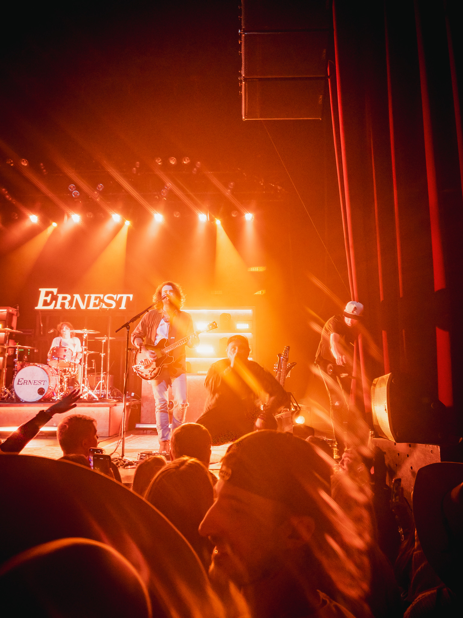 a man plays music onstage
