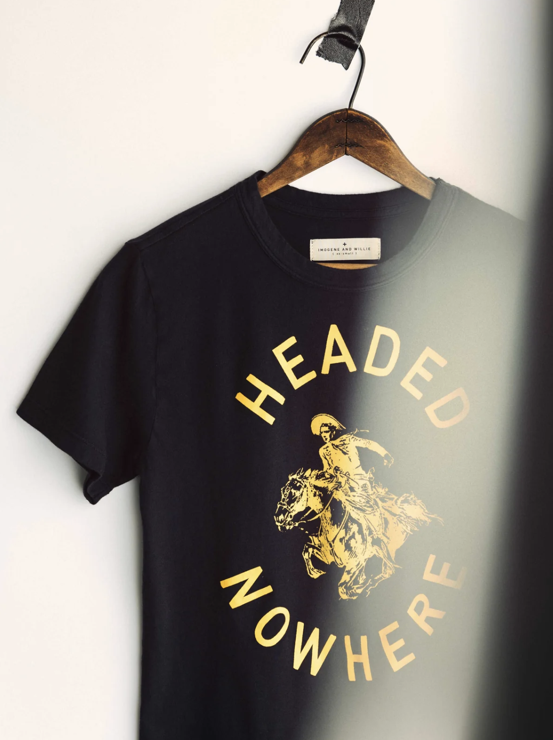 Black t-shirt with cowboy graphic and text heading nowhere