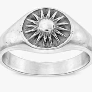A signet ring with a sun on it